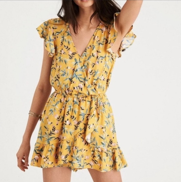 American Eagle Outfitters Pants - American Eagle Floral Wrap Yellow Romper
